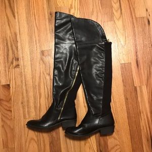 Black, knee high boots.